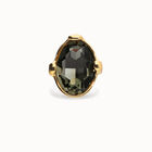 Large ring with oval faceted gray crystal